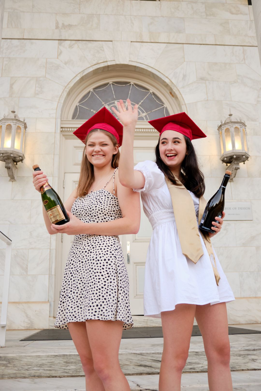 2 Females Champagne Graduation Portrait